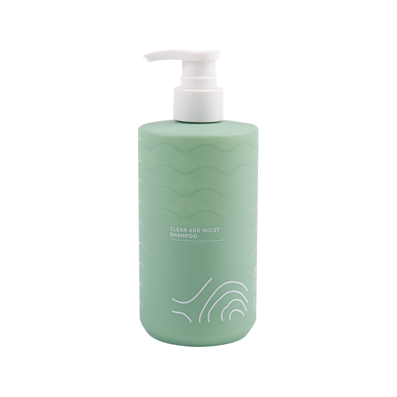 Grøn plastpresse shampoo flaske